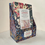 Colorful box with maps of London on a white background