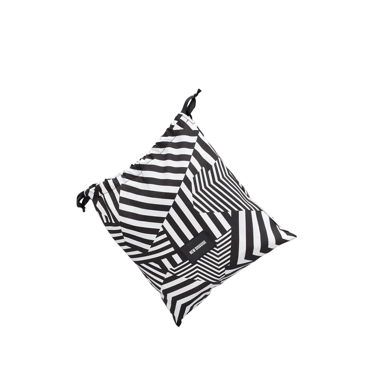 A black and white striped reusable bag with a drawstring closure and a small black brand tag, shown floating against a light gray background.