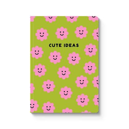 Notebook with pink flowers and smiley faces on a green background, labeled 'Cute Ideas'.