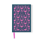 Notebook with pink book pattern and 'Page Turners Anonymous' text on a teal background