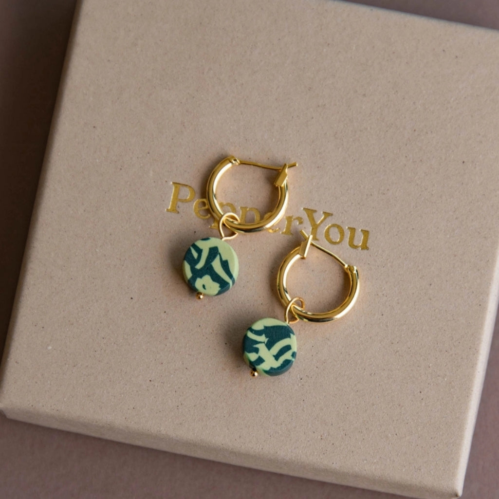 Green Circle Charm Hoops on box