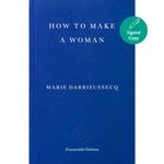 A hardcover book titled 'HOW TO MAKE A WOMAN' by Marie Darrieussecq, published by Fitzcarraldo Editions. The cover is a solid deep blue with white text.