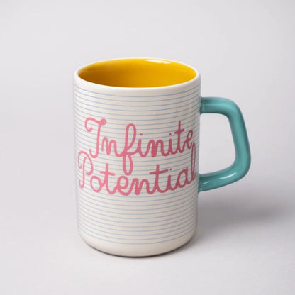 Mug with 'Infinite Potential' text on a white background