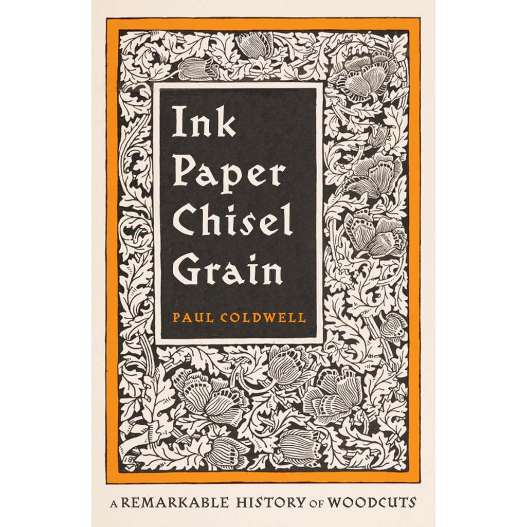 Book cover of 'Ink Paper Chisel Grain' by Paul Coldwell, featuring a black central title panel with white serif text, surrounded by an ornate black-and-white floral woodcut border and an orange inner frame, with the subtitle 'A Remarkable History of Woodcuts' below.