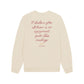 Beige sweatshirt with red text on a white background