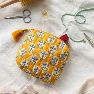 Yellow Floral Quilted Pouch Lifestyle shot