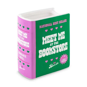Book-shaped vase with 'Meet Me at the Bookstore' text on a white background