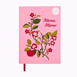 Pink notebook with floral design and 'Mirror, Mirror' text on a white background