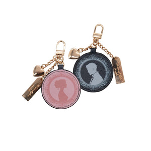 Pride and Prejudice Bag Charm, showing both sides of the design