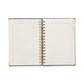 Open planner with daily layout on a white background