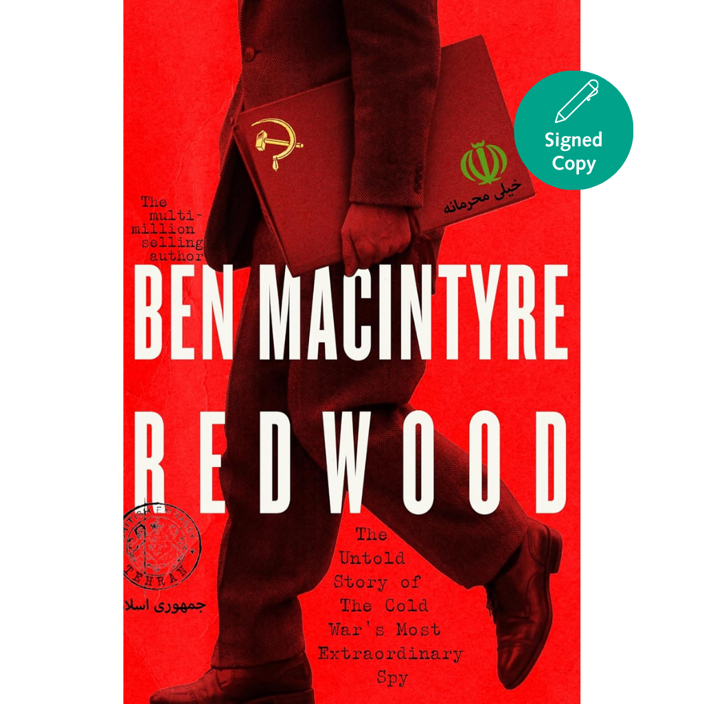Book cover for 'Redwood' by Ben Macintyre, featuring a red background with a cropped figure in dark clothing holding a book with an Iranian flag emblem. Large white title text is overlaid, with a teal 'Signed Copy' badge in the top right.