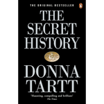 Book cover of 'The Secret History' by Donna Tartt, featuring a black background with large white serif title text, a small gold coin illustration, and the Penguin logo at the top right.