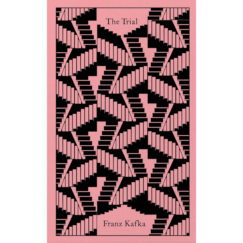 The Trial book cover by Franz Kafka, featuring a pink background with a black and pink geometric staircase pattern and black text.