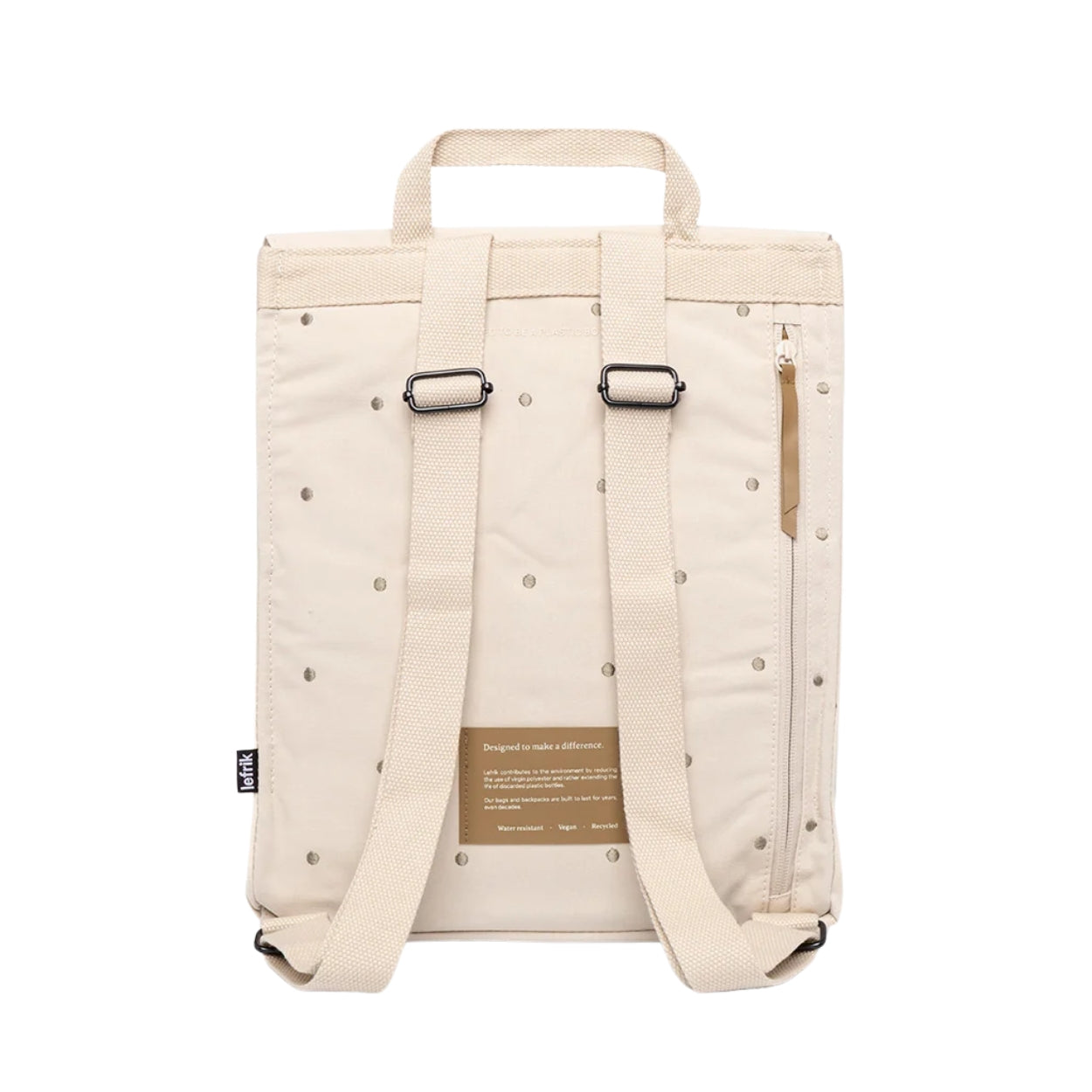 An off-white backpack with a dotted ecru pattern, dual adjustable shoulder straps with black metal buckles, a top carry handle, and a vertical zippered pocket on the right side. A brown paper label is attached near the bottom center.