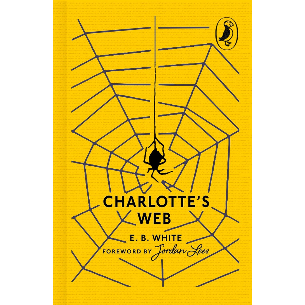 Book cover of 'Charlotte's Web' with a spider in a web on a yellow background