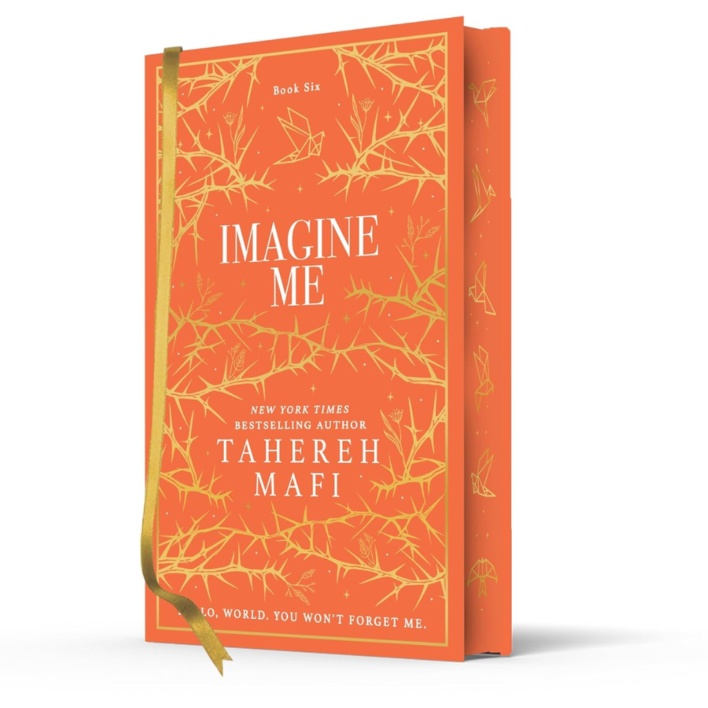 Book titled 'Imagine Me' by Tahereh Mafi with an orange cover and gold accents on a white background