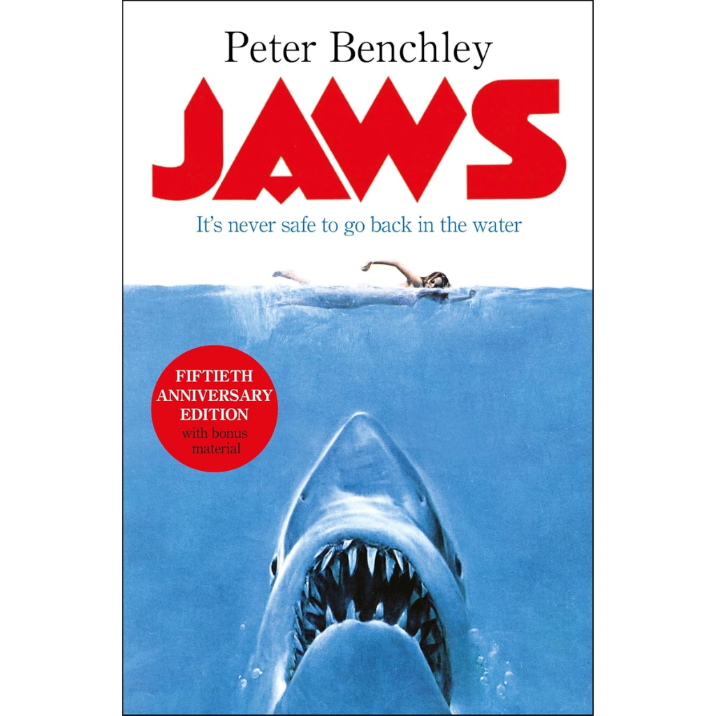Book cover of 'Jaws' by Peter Benchley with a shark and swimmer underwater.