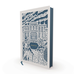 Book with decorative cover featuring illustrations and text on a white background
