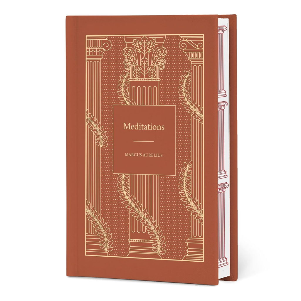 Book titled 'Meditations' by Marcus Aurelius with decorative cover design on a white background