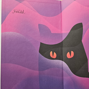 A close-up of a book or printed cover featuring a stylized black cat face with pink eyes against wavy pink and purple abstract shapes. The word 'Jenkid' appears in script near the upper left.