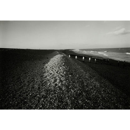 People on shingle beach