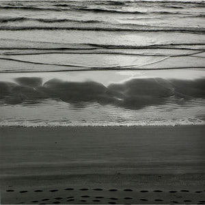 Waves breaking on shore.