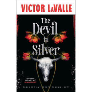 Book cover of 'The Devil in Silver' by Victor LaValle with a skull and flowers design.