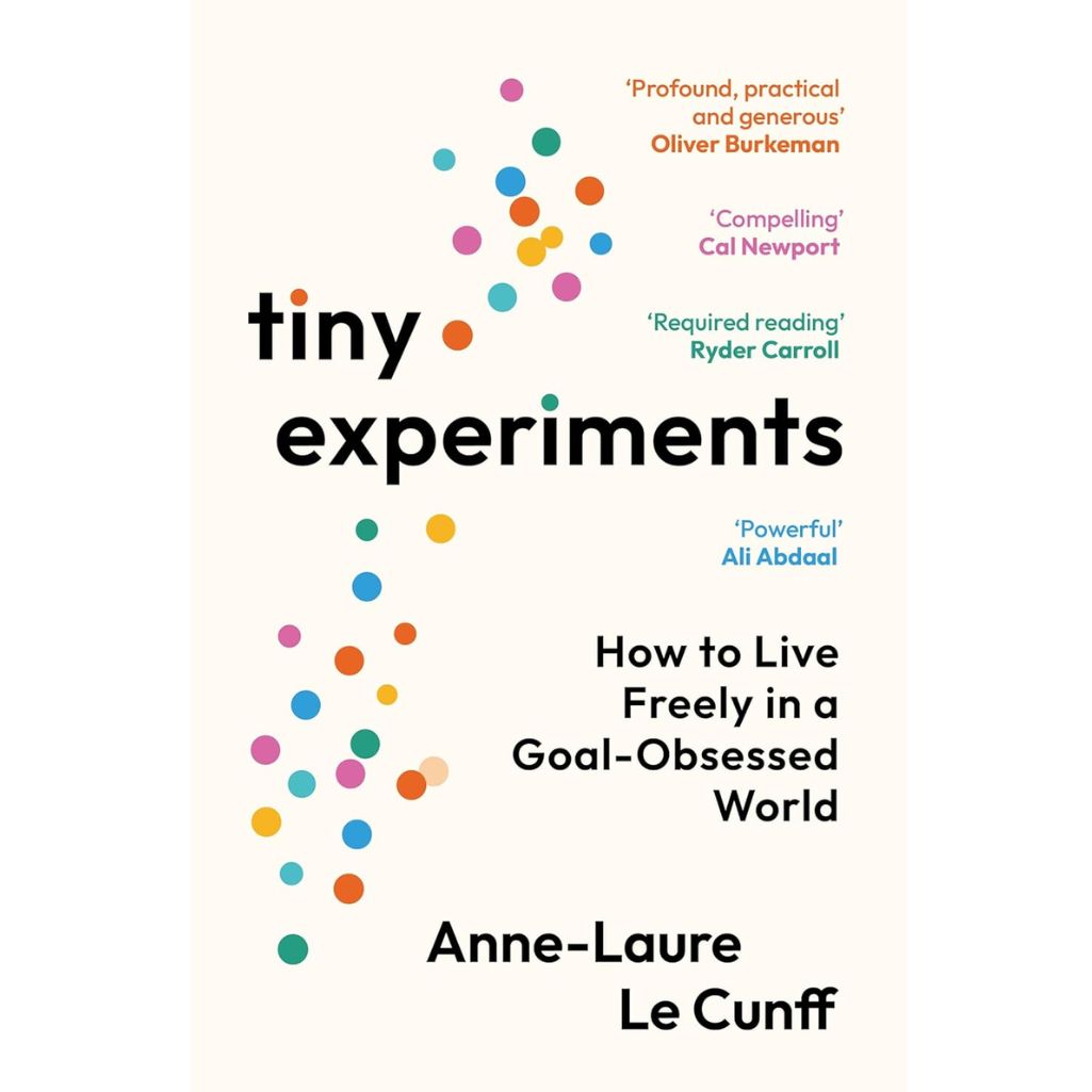 Book cover of 'Tiny Experiments' by Anne-Laure Le Cunff with colorful dots and reviews on a white background.