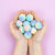 Unicorn Poo Bath Bombs in hands
