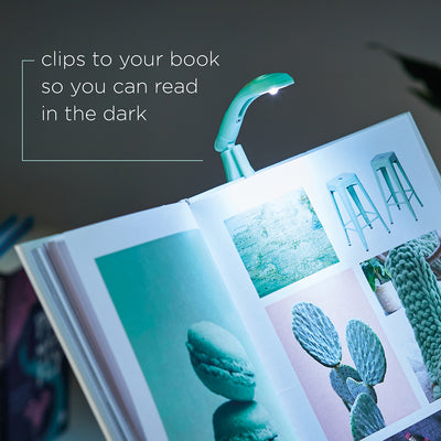 Image of Mint Green Book Light clipped onto book