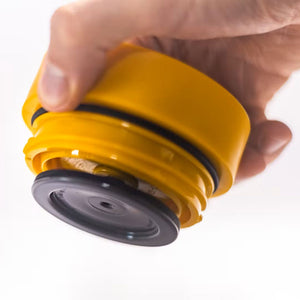 Circular Cup 12oz Black & Electric Mustard Lid in use