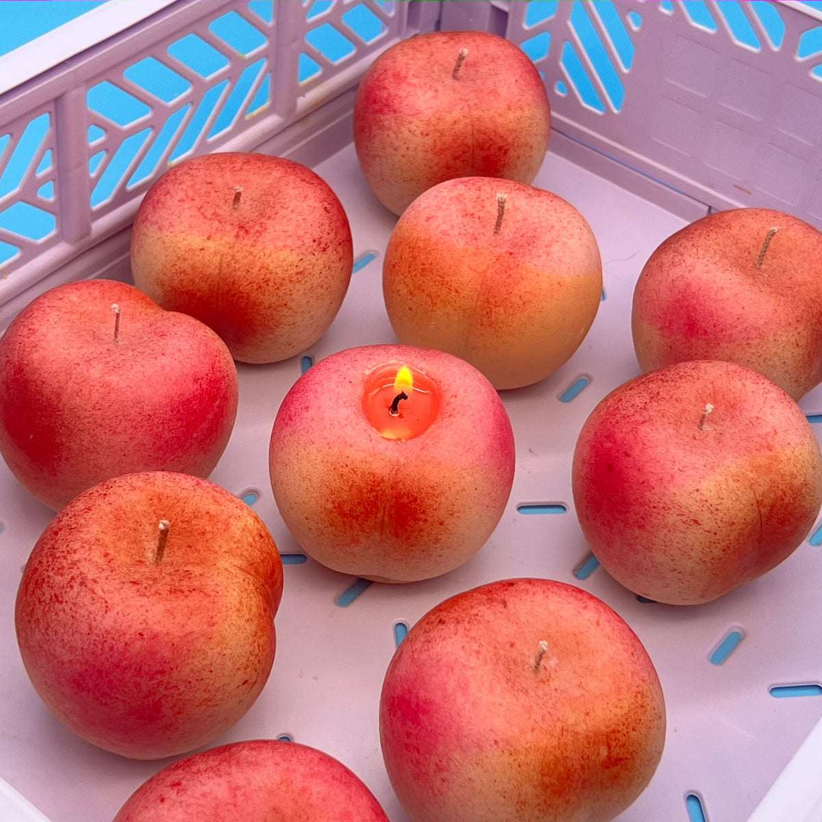 Peach Soy Candles in a crate