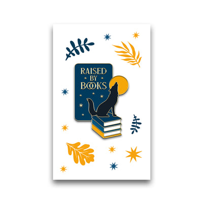 Raised By Books Enamel Pin on backing card