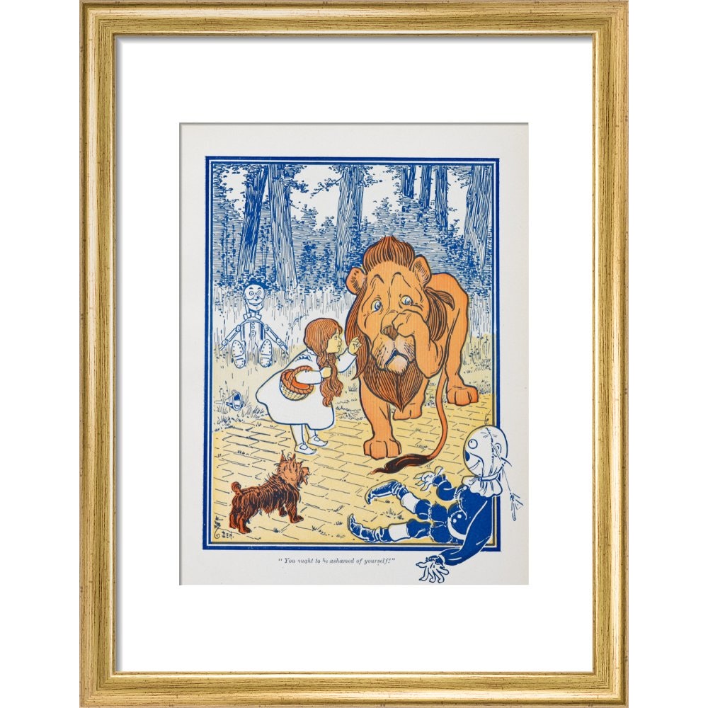 The Cowardly Lion print in gold frame