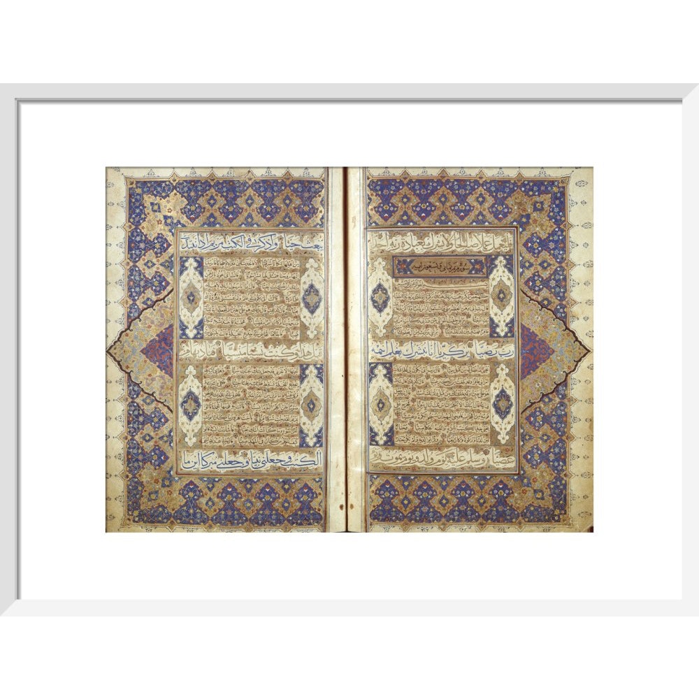 A Qur'an print in white frame