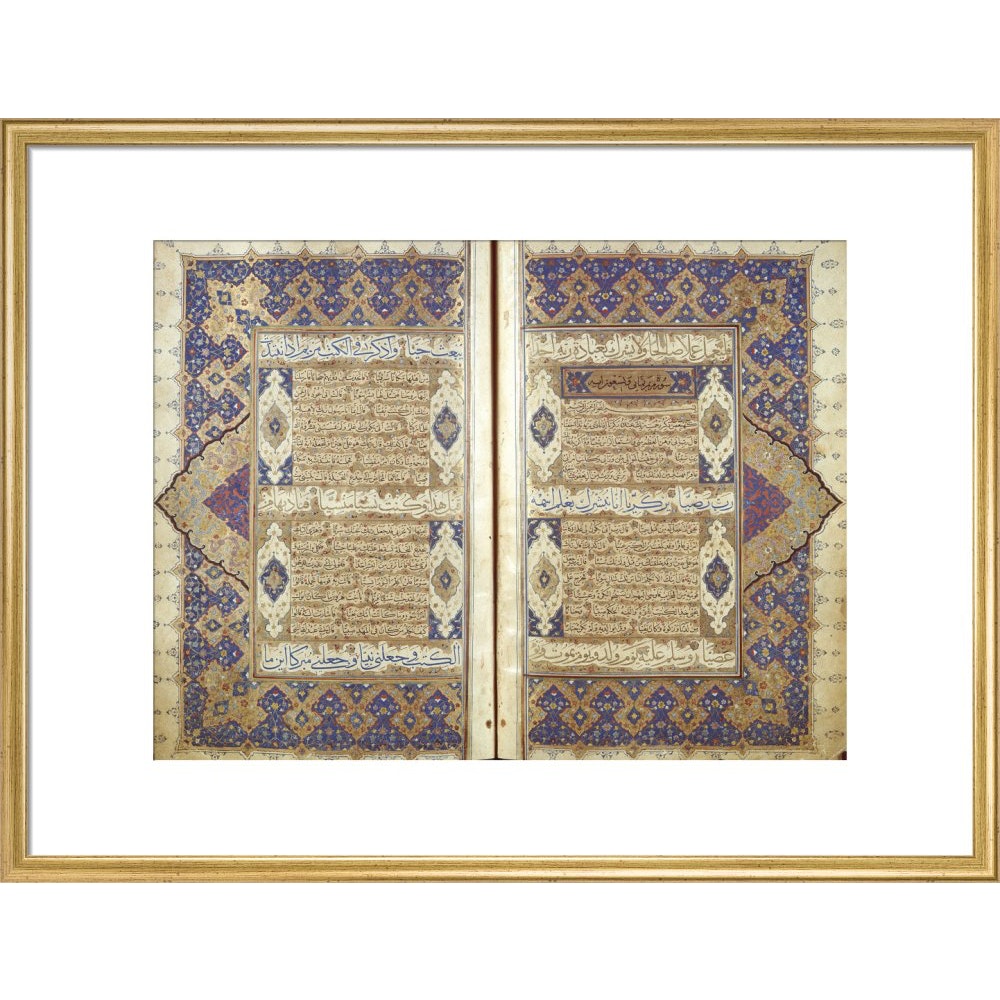 A Qur'an print in gold frame