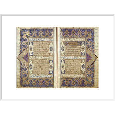 A Qur'an print in white frame